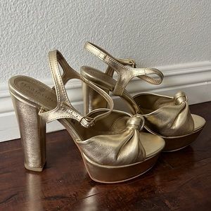 Gold platform heels